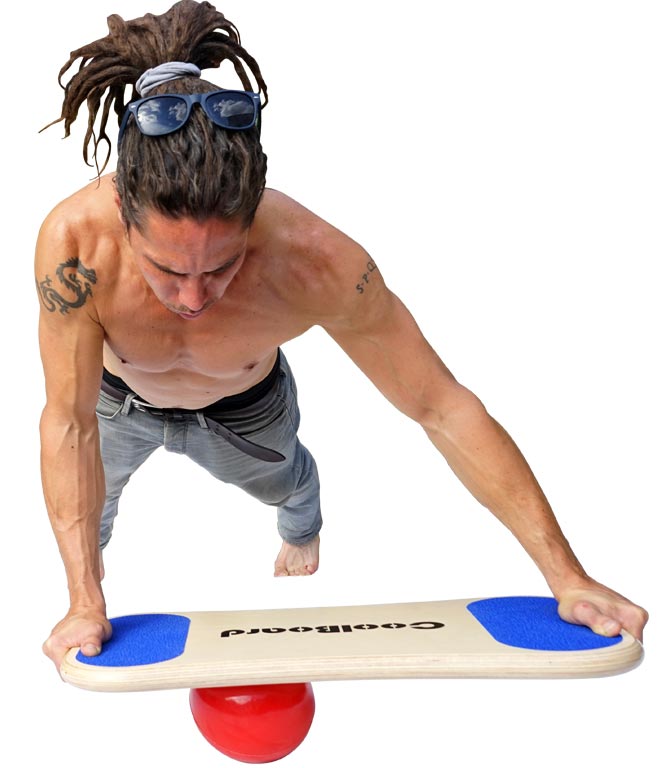 Man with ripped muscles doing Core Busting Core Exercise CoolBoard Sliding Plank